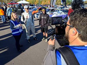Kelsey Stephens and Calvin Cooper doing interviews at parc expose prior to the ceremonial start.