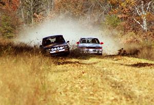 The Todd Jarvey / Rich Faber Mitsubishi Galant VR4 passes the Mike Halley / Emily Burton-Weinman Dodge Ram 50.