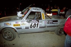 Mike Halley / Emily Burton-Weinman Dodge Ram 50 rolls and DNF's the event.