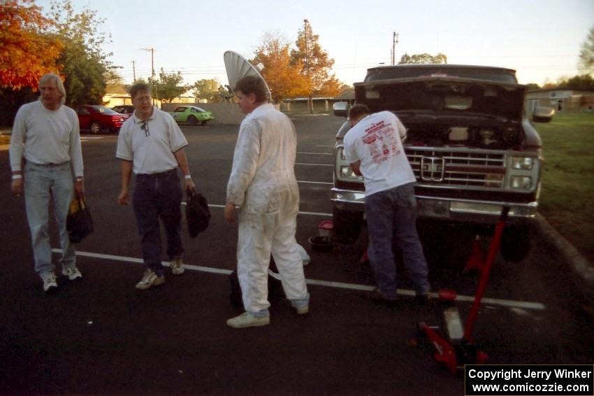 Al Kintigh and J.B. Niday chat with Mike Halley and his mechanic the night before the event.