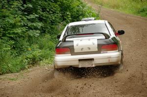Chris Barribeau / Alex Ferencz Subaru Impreza RS on SS1, Crossroads I.