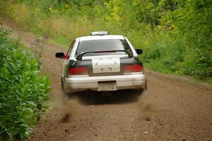 Chris Barribeau / Alex Ferencz Subaru Impreza RS on SS1, Crossroads I.