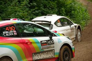 Allen Dobasu / Patrick Walsh Ford Fiesta passes the Lucy Block / Michelle Miller Ford Fiesta Rally3 on SS1, Crossroads I.