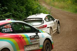 Allen Dobasu / Patrick Walsh Ford Fiesta passes the Lucy Block / Michelle Miller Ford Fiesta Rally3 on SS1, Crossroads I.