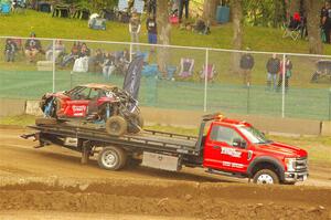 Robin Shute's Can-Am Maverick X3 is hauled away, done for the weekend.