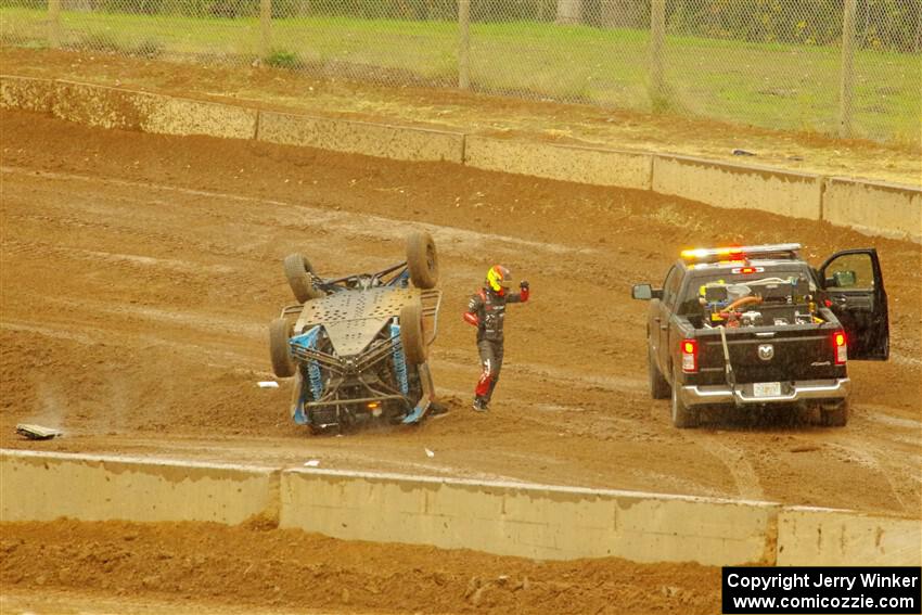 Robin Shute emerges A-OK from his Can-Am Maverick X3 after flipping.