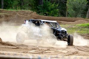 Terry Madden's Can-Am Maverick X3 snaps the front suspension and limps off the track.