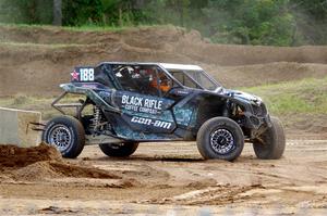 Terry Madden's Can-Am Maverick X3 snaps the front suspension and limps off the track.