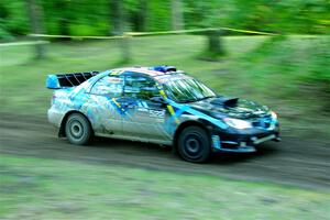 Matt James / Jackie James Subaru Impreza limps through SS16, Soo Pass East II, with a right-front flat.