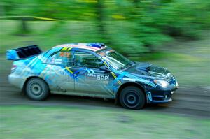 Matt James / Jackie James Subaru Impreza limps through SS16, Soo Pass East II, with a right-front flat.