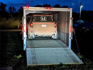 Chris Sladek / John Sharps Honda Passport on the trailer and on the way home.