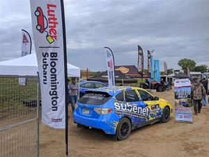 Scott Putnam's Subaru WRX STi rally car on display.