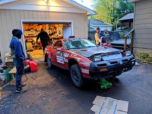 Al Dantes, Jr. / Keegan Helwig Mazda RX-7 LS at Al's garage the night before the rally.