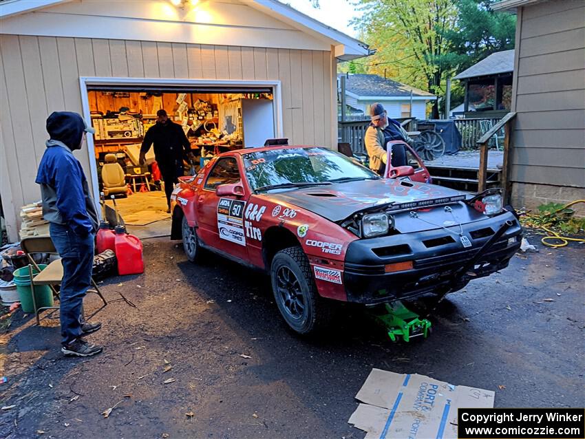 Al Dantes, Jr. / Keegan Helwig Mazda RX-7 LS at Al's garage the night before the rally.