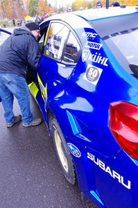 Steve Gingras chats with Travis Pastrana / Rhianon Gelsomino Subaru WRX STi at the ceremonial start.