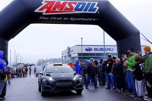 Allen Dobasu / Patrick Walsh Ford Fiesta leaves the ceremonial start.