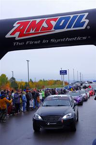 Michael Hooper / Claudia Barbera-Pullen Lexus IS350 leaves the ceremonial start.