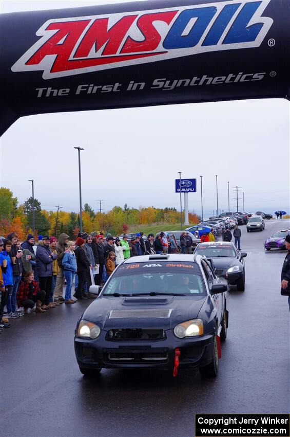 Dylan Murcott / Andrew Sims Subaru WRX STi leaves the ceremonial start.