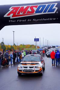 Tim Whitteridge / Ryan Dunham Mitsubishi Lancer Evo VIII leaves the ceremonial start.