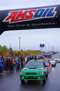 Jordan Locher / Tom Addison Subaru Impreza 2.5RS leaves the ceremonial start.
