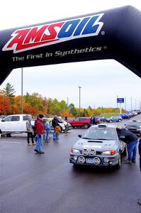 Nick Morris / Josh Kemp Subaru Impreza leaves the ceremonial start.