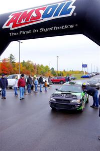 Carlos Neto / Fabio Costa Subaru 2.5RS leaves the ceremonial start.