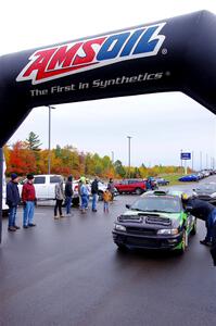 Carlos Neto / Fabio Costa Subaru 2.5RS leaves the ceremonial start.