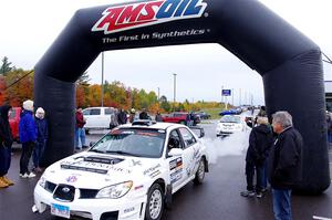 Pete Schaefer / Kevin Dobrowolski Subaru Impreza 2.5i leaves the ceremonial start.