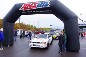 Richard Donovan / Greg Donovan Subaru Impreza leaves the ceremonial start.