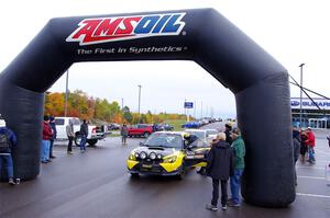 Colin Schulz / Jake Carlson Subaru WRX STi leaves the ceremonial start.