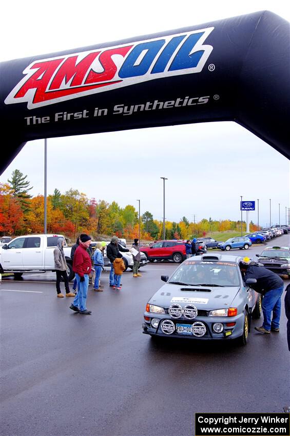 Nick Morris / Josh Kemp Subaru Impreza leaves the ceremonial start.
