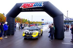 Colin Schulz / Jake Carlson Subaru WRX STi leaves the ceremonial start.