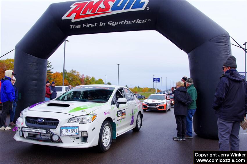 Jamey Randall / Geoff Youngdahl Subaru WRX leaves the ceremonial start.