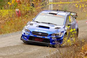 Travis Pastrana / Rhianon Gelsomino Subaru WRX STi on SS1, Passmore North I.