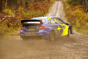 Travis Pastrana / Rhianon Gelsomino Subaru WRX STi on SS1, Passmore North I.