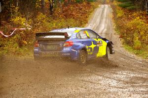 Travis Pastrana / Rhianon Gelsomino Subaru WRX STi on SS1, Passmore North I.