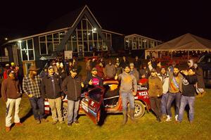 Former crew and co-drivers pose with the Al Dantes, Jr. Mazda RX-7 LS.