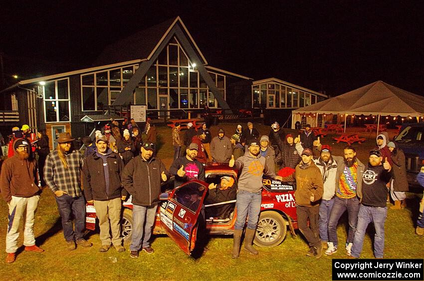 Former crew and co-drivers pose with the Al Dantes, Jr. Mazda RX-7 LS.