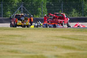 Three cars tangled on the first turn of lap one, race 1.