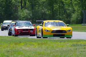 Matt Gray's GT-2 Ford Mustang, Mike Wagner's ITE-1 BMW M3 and Derek Wagner's T3 BMW 330