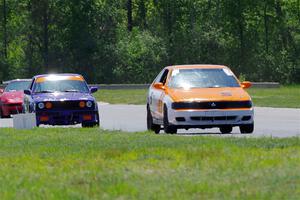 Sam Fisher's ITA Nissan 200SX SE-R and Dave LaFavor's ITS BMW 325is