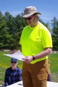 J.B. Lewis assembles crews for stage assignments.