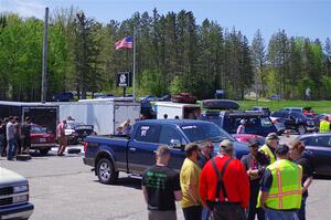 Workers prepare to head out to the stages after the meeting.