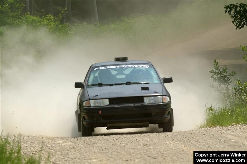 Jacob Kennedy / James Smith Ford Escort GT on SS1, Camp 3 North.