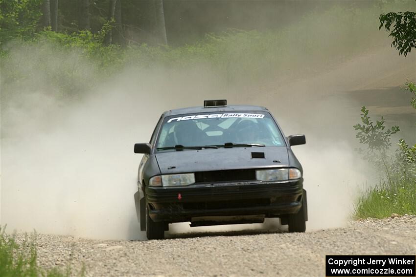 Jacob Kennedy / James Smith Ford Escort GT on SS1, Camp 3 North.