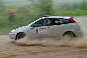 Srikanth Nayini / Otis Lee Miller Ford Focus SVT slides to a stop on SS2, Skunk Creek.