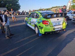 Rob Sanders / Ashley Speare Subaru WRX STi pulls in during Thursday evening's parc expose.