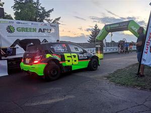 Pat Moro / Claudia Barbera-Pullen Chevy Sonic LS at Thursday night's ceremonial start.