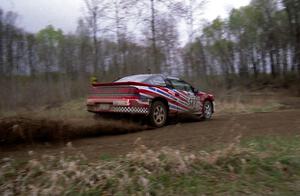 Mike Cienkosz / Yurek Cienkosz set up their Mitsubishi Eclipse GSX for a 90-left on SS2.