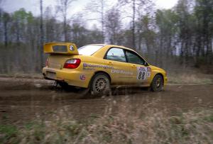 Graham Price / Scott Putnam set up their Subaru WRX STi for a 90-left on SS2.